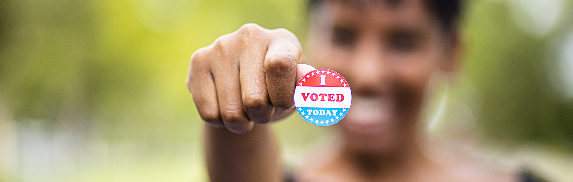 Young Black Woman with I Voted Sticker